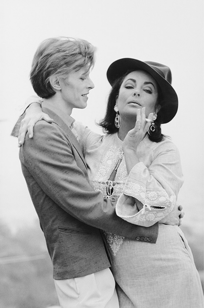 David Bowie &  Elizabeth Taylor in Beverly Hills, 1975 Art Print