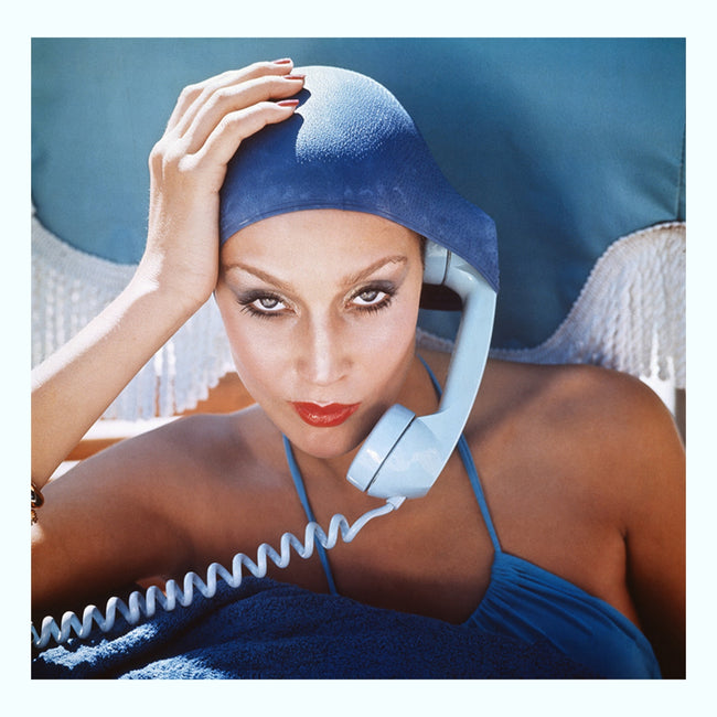 Jerry Hall Takes a Call in the Pool, 1975 Art Print