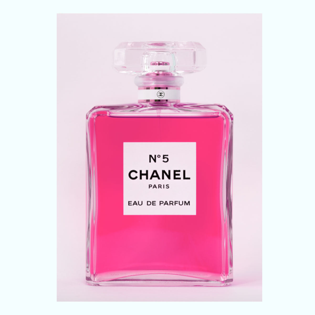 channel bottle with pink liquid inside